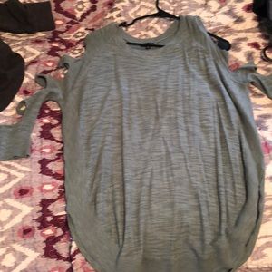 Sweater with sleeve cut outs